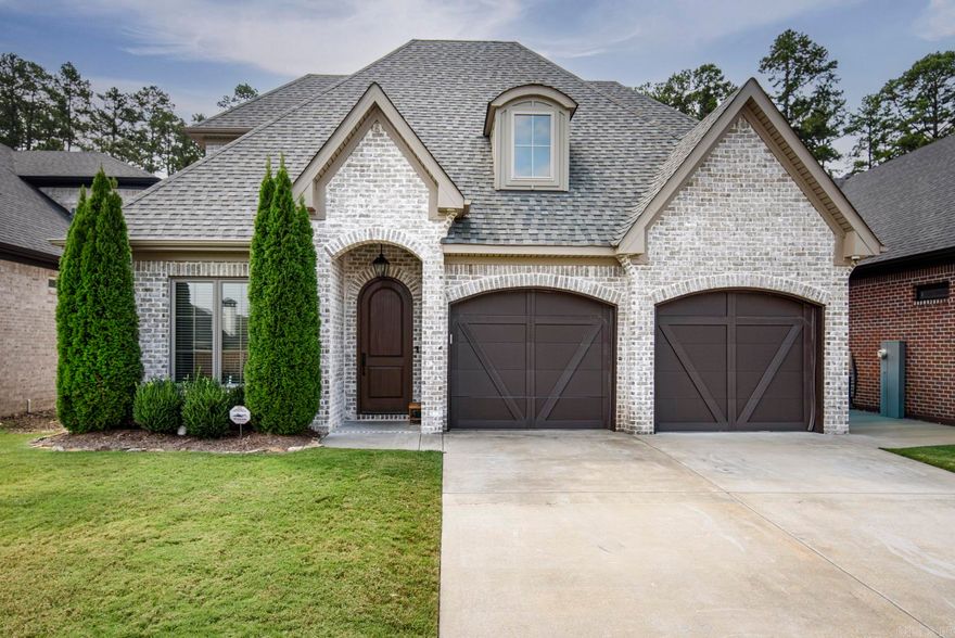 Builders’ Own Custom Home with high-end finishes and European architecture. Neighborhood amenities include park, pool, and playground. Main level features hardwood floors, private owner’s suite with spa bath and custom walk-in closet, plus a guest ensuite. Gourmet kitchen offers custom cabinetry, oversized island with storage, and butler’s pantry, opening to fireside great room. Private home office and guest powder bath complete the main. Upstairs offers third ensuite and spacious playroom or optional 4th bedroom with bath access. Outdoors enjoy a fenced yard backing to greenspace with gutters and sprinkler system.