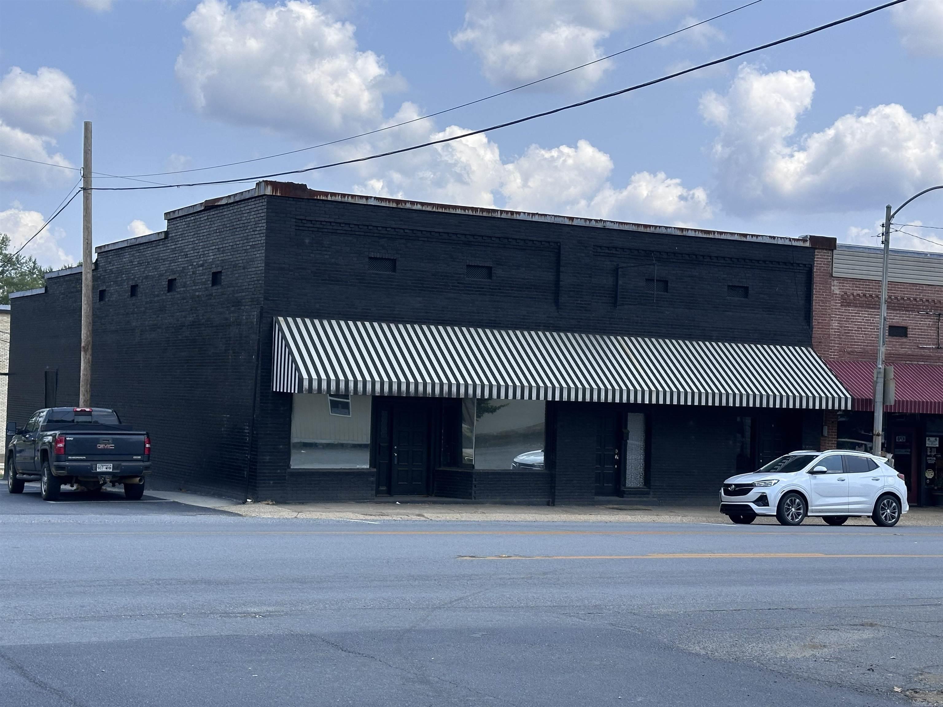 3779 SF ā Prime Downtown Sheridan Corner Building Located in the heart of downtown Sheridan, this 3,779 SF corner property is divided into three separate suites, offering flexibility for a wide range of uses. The building provides excellent visibility along with a charming historic character that complements the downtown district. Potential uses could include a professional office seeking supplemental income by leasing the additional suites, retail, service-oriented businesses, or other mixed-use opportunities.