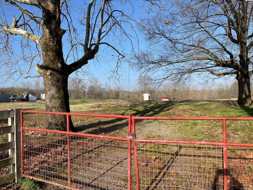 151 acres located at the Saline County and Pulaski County line. This property is unrestricted and utilities are readily available. It features rolling pasture land with a meandering creek, offering great development potential and state highway frontage. Contact us today for further details.