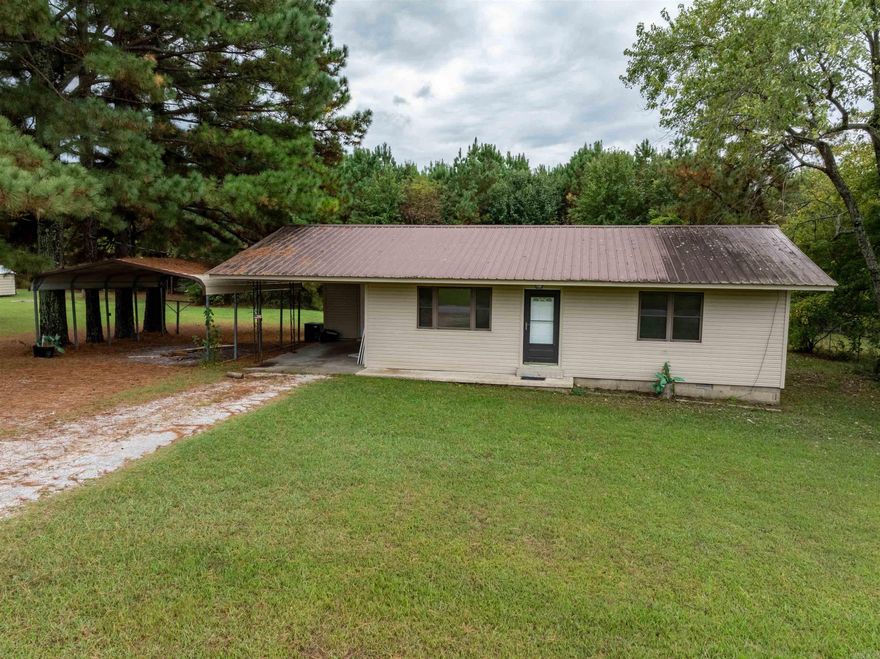 Nicely remodeled 2-bedroom, 1-bath brick home in Cave City, AR, just off Highway 167. This charming all one-level home is approx. 865 sq ft with a metal roof for low maintenance and efficiency. Features include an attached carport, additional side carport, mature trees, and a quiet street setting. Easy to heat, cool, and keep clean—perfect for first-time buyers, downsizing, or anyone wanting a move-in ready property. The sellers have updated this home throughout, making it ready for you!