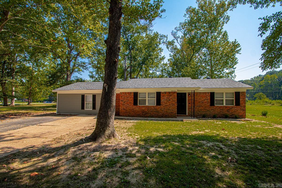 Your new home is waiting! This quaint charmer offers country living in the city! Sitting on a half acre, it comes fully remodeled with new siding, a new roof, new kitchen and bathrooms, flooring, paint and fixtures. Four bedrooms and 2 living areas allow plenty of space for a growing family. The only thing missing is you! Shannon Hills & Bryant School districts.