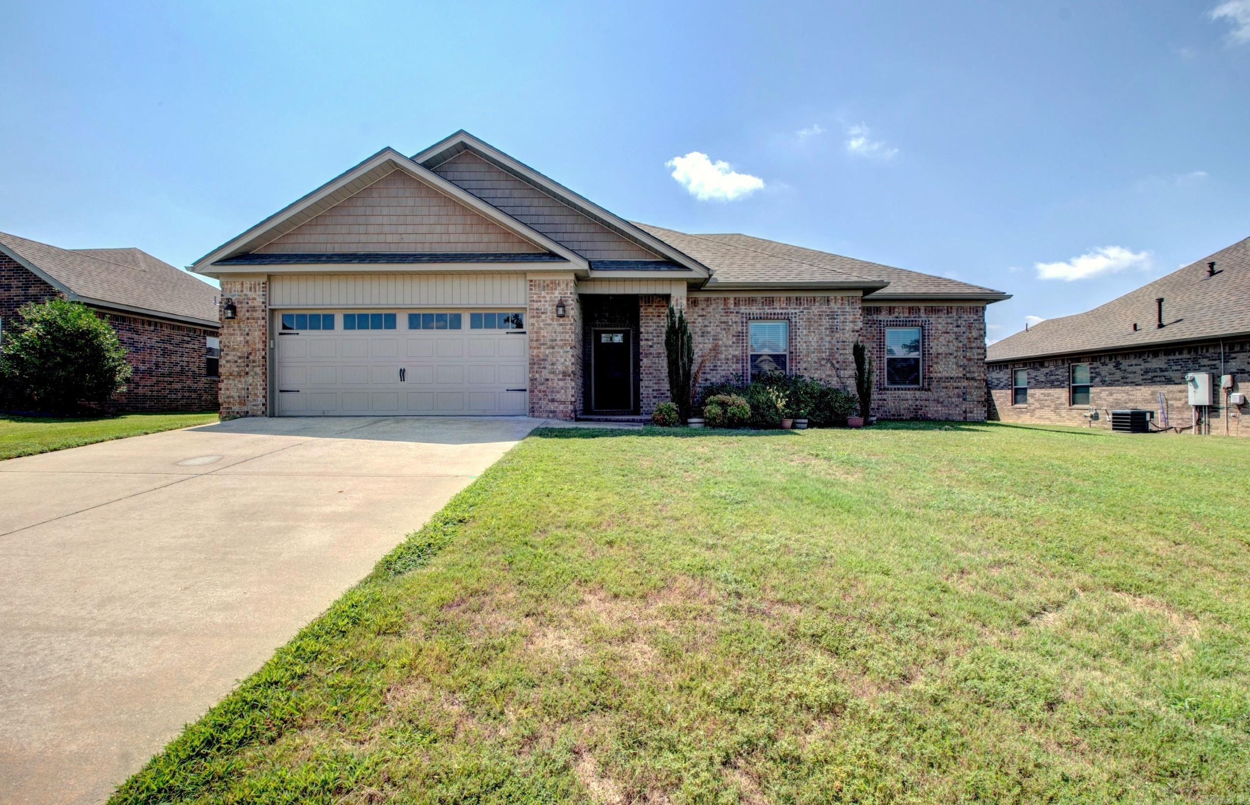 Welcome home! This spacious 4-bedroom home in the Cabot School District has a split floor plan that works perfectly for everybody! The living room is bright and welcoming thanks to a large custom window that lets in tons of natural light. The kitchen has plenty of storage, a pull-out pantry, granite counters, a farmhouse sink, and a big island that makes it easy to cook, serve, or just hang out. The primary suite has everything you need — a walk-in closet, double sinks, a separate shower and tub, and lots of space to get ready in the mornings. The other bedrooms are a great fit for guests, or even a home office. Outside, you’ll find a fully fenced backyard for pets, play, or backyard BBQs. This home is move-in ready, and close to schools, amenities and everything in Cabot and Austin. Agents please see remarks.