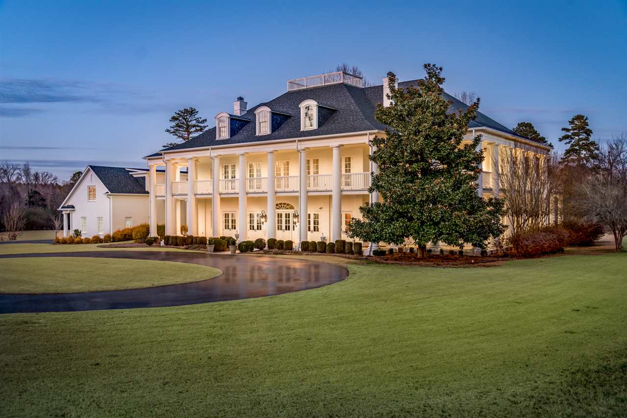 This extraordinary & iconic estate built by Jack Hartsell is located on a prime 5 acre lot, 4 minutes from the heart of West Little Rock. The main home offers 7,540 sqft plus a guest home w/ 1,340 sqft over the 5 car garage. The floor plan was designed w/ formal & informal spaces for entertaining & family living. Main level features a dining room, study, gourmet chef’s kitchen open to a hearth rm & den, master & guest suite. Upstairs offers 4 guest suites, a game room & laundry rm. Gunite pool + more!
