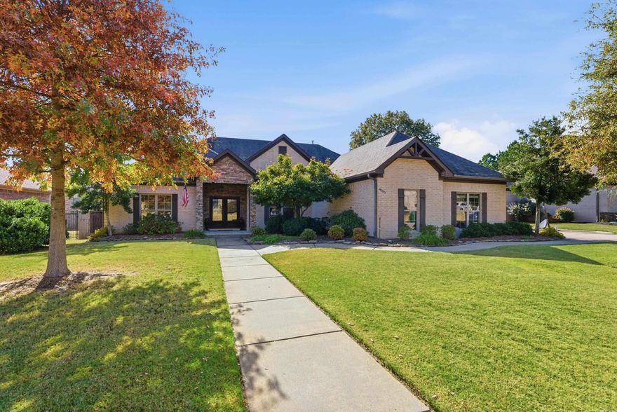 This home is the kind of place that instantly becomes your favorite part of the day! The layout strikes the perfect balance between beautiful spaces & smart features that make everyday life easier. All 4 bedrooms & 3 full baths are tucked onto one easy, comfortable level. At the heart of it all is a stunning kitchen. The 9x4-ft island is the perfect gathering spot for pancake mornings or late-night chats. High-end touches—double oven, pot filler, extra prep sink, & endless cabinetry—make cooking a joy. Off the main area is a dedicated laundry room w/ a built-in drop zone that keeps day-to-day chaos neatly out of sight. Outside, the 600+ sq ft screened-in porch is truly a bonus living room. Whether you’re sipping morning coffee or hosting game day, it’s a space that feels like a retreat. The 3-car garage w/ backyard access is another perk. You’ll find timeless details throughout —10-foot ceilings, wide trim, crown molding, wood floors, and stone accents—that are both luxurious & welcoming. Practical upgrades like a central vacuum, full stairs to the attic for a future bonus room, & a Jack-and-Jill bathroom connecting 2 of the bedrooms make the home as functional as it is beautiful.