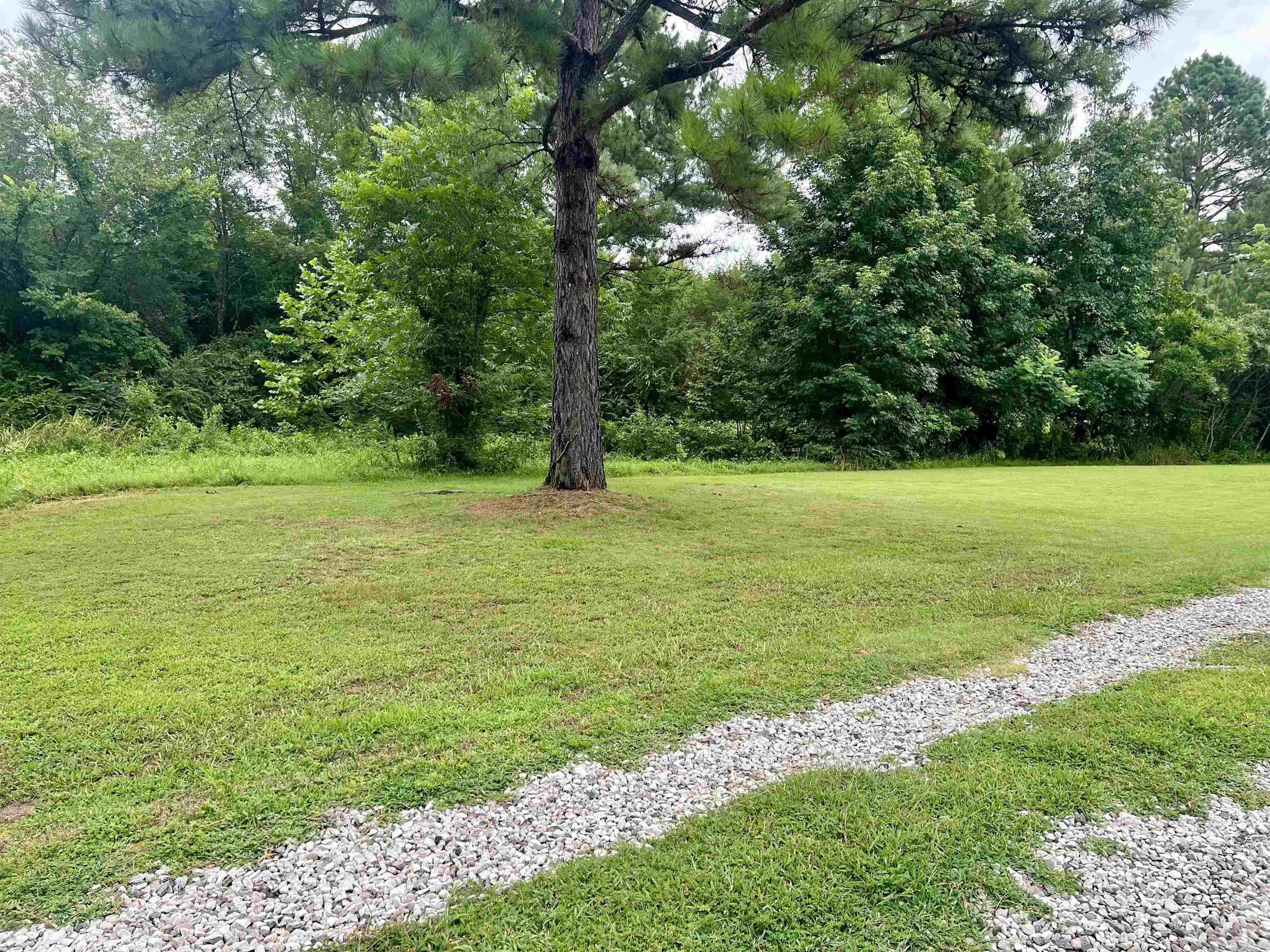 .83 acre tract with septic, water meter in place. Gas and electric available for connection. No mobiles, mineral rights do not convey.