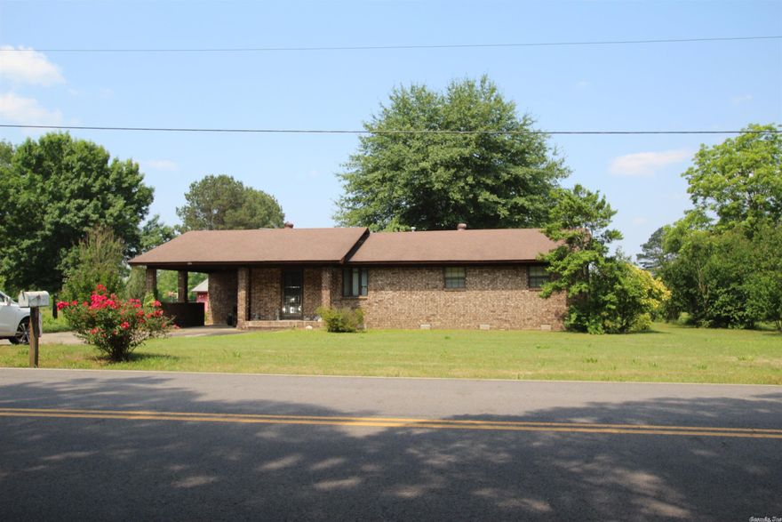 If you want to feel like you live in the country but actually just hidden behind the hustle and bustle, then this is your perfect spot. 3 bedrooms 2 baths with a very large living room, laundry room, and kitchen/dining. Outside you will find a large workshop with concrete floor, and a storage shed with dirt floor. Extra room behind the shop to use a a huge play area, pet area, or garden. One car carport with a removable ramp. Central HVAC and newer roof. A good solid built home with huge potential. Just needs a little updating. Everything is in perfect working order. All flooring is in good shape, walls are good, just could use a little paint maybe. A long concrete extra drive back to the workshop where you could have your own side business in your back yard. Easy to find and the perfect More...