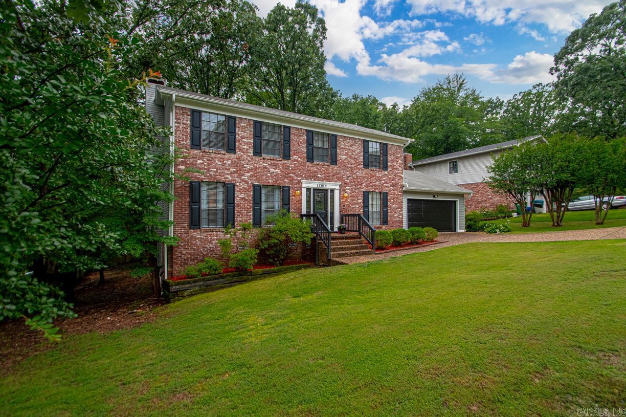 Welcome to 15917 Patriot Drive, a beautifully updated two-story traditional home nestled in the heart of West Little Rock. With approximately 2,688 square feet, this spacious 4-bedroom, 2.5-bathroom home combines classic charm with recent updates for comfortable and stylish living. The home features a new roof installed in 2020 and numerous recent updates both inside and out, making it truly move-in ready. The main level features a cozy family room, and a spacious kitchen with plenty of storage and updated finishes. Upstairs, the primary suite offers a private retreat with ample closet space and a well-appointed ensuite bathroom. Three additional bedrooms provide plenty of space for family or guests. One unique feature of the home is the versatile flex room on the lower level—ideal for a home office, workout space, playroom, or hobby area to suit your lifestyle needs. The backyard offers a quiet outdoor escape, perfect for relaxing or entertaining. Conveniently located near shopping, dining, top-rated schools, and outdoor recreation, this home provides the perfect balance of tranquility and accessibility in one of Little Rock’s most desirable areas.