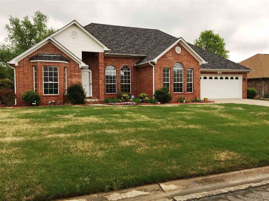 Perfectly clean house with New Heat & Air, New roof with transferable warranty, New dishwasher, microwave, and disposal. Split floor plan, beautiful wood floors - House is IMMACULATE! Eat-in kitchen -. Blinds replaced, well-kept, neutral colors, New floors in BR & hall. Has always inspected Heat & Air twice a year. Tiled both porches, new outside lights, replaced all hardware and fans, removed carpet and added wood in front bedroom... spotless! Added new glass storm door to front and back. New ADT alarm.