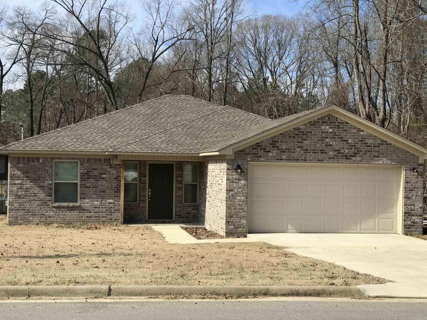 Conveniently located move in ready 3/2 in Benton Schools.  Split floorplan with beautiful hardwood flooring in living room and halls, tile in wet areas, carpet in bedrooms, upgraded granite, stainless appliances, crown molding, faux wood  2" blinds, covered back porch, and fenced back yard. NO special assessment on this one!