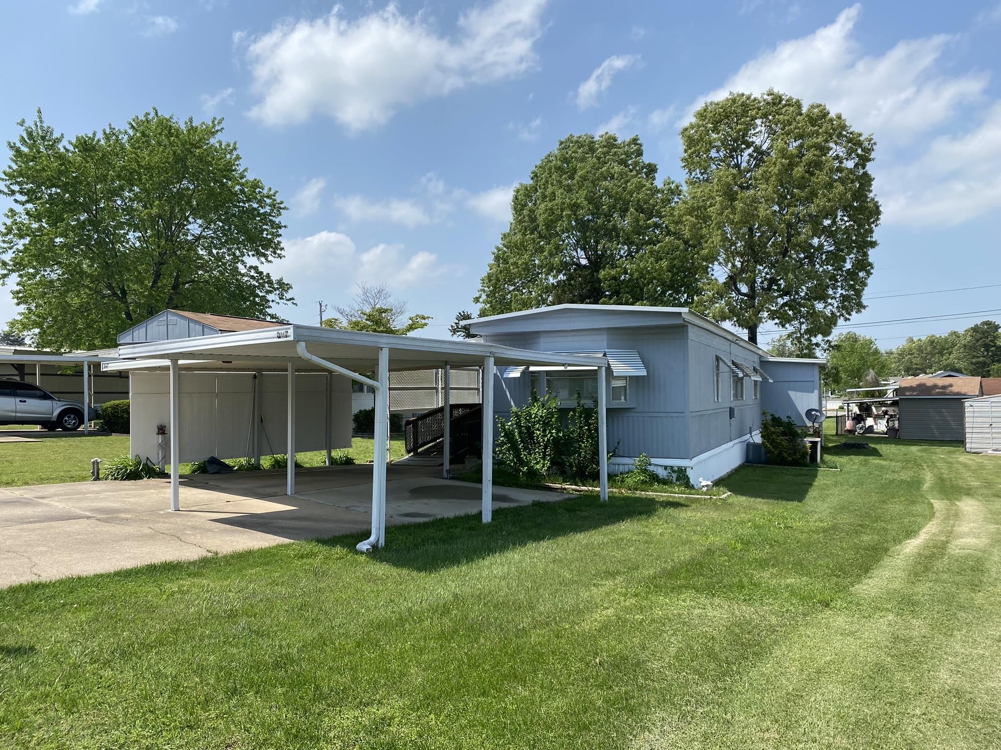 REDUCED PRICE! Well maintained 2 bedroom/2 bath single wide mobile home. Located in 55+ Rolling Meadows Mobile Home Park. Home features a handicap accessible from both sides, recently updated 10x32 covered deck, 8x12 storage shed, also the back deck has been enclosed to allow for more storage. Inside the home features hardwood cabinets and a split bedroom plan. Very clean and move in ready.