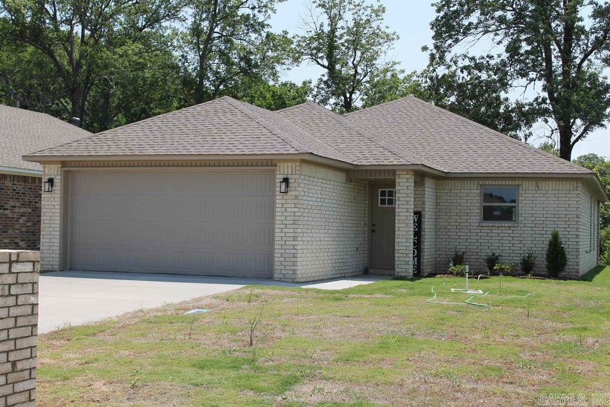 Are you looking for a New Construction house in the Brookland school district? We have it, this one is built by Mark Morris Construction, a name you know and trust. The amazing thing is, is that this house is located in the City Limits of Jonesboro. City Water and Light utilities are a huge bonus! The house features three bedrooms two bath with Luxury Vinyl Planks, Carpet and Granite countertops. Also included, is a two car garage and a covered porch. The HOA has not been set up but expected to be $100.00 a year. Construction will be complete in 45 days.