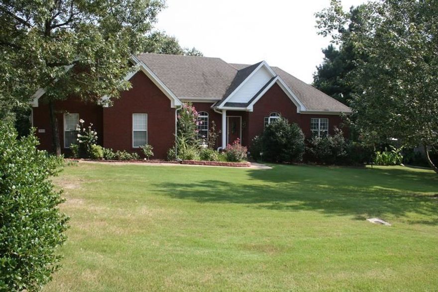 Beautiful brick home on a one half acre lot. The formal dining room is just off the entryway. The family room lies just ahead and features a fireplace, plush neutral carpeting and a lofty ceiling. The eat-in kitchen offers a breakfast bar, walnut cabinetry and a pantry. The spacious master features a tray ceiling, a corner jetted tub and his and her vanities. The covered deck overlooks the shaded back yard. Other amenities include an unfinished bonus space, a two car garage & exterior accent lighting.