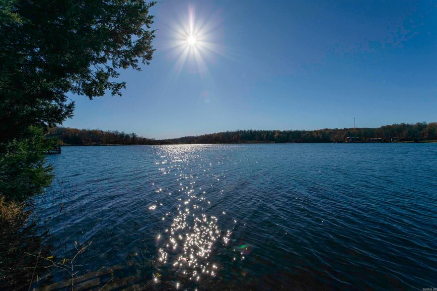 Prime Lakefront opportunity: Serenity awaits at Ozark acres. This undeveloped lakefront lot provides the perfect elevation to build your new Lake home in the Ozarks. Lot would be ideal for a walk out basement to provide plenty of room for guests and entertaining. If Lakefront lifestyle is what you are looking for this is your blank canvas to make it exactly the picture you would like. Beautifully wooded, offering privacy and a sense of immersion in nature, you are never far from modern comforts. The property is governed by a bill of assurance for new constructions. Please note that mobile homes are not permitted, ensuring that the community maintains its high standards and desirable surroundings. The seller is willing to offer a seller financing option with no less than 25% down @ 10% interest prefer 36 month term.