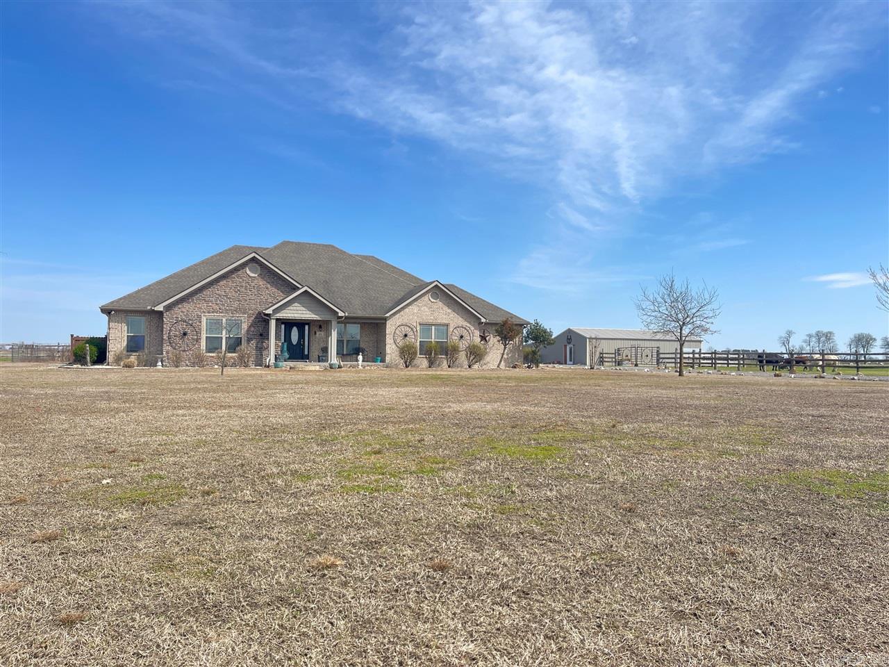One of a kind!!! Check out this beautiful custom-built home in the country! This home features 3 large bedrooms and 3 bathrooms. This home is less than 10 years old and sits on +/- 36 acres that is currently fenced for livestock. There are several livestock barns on the property as it is currently a working cattle farm. Cool off in the huge in ground pool this summer after a long day working the farm. This home was built with entertaining in mind and was built to last a lifetime. Don't miss this oppurtunity to own your own ranch.