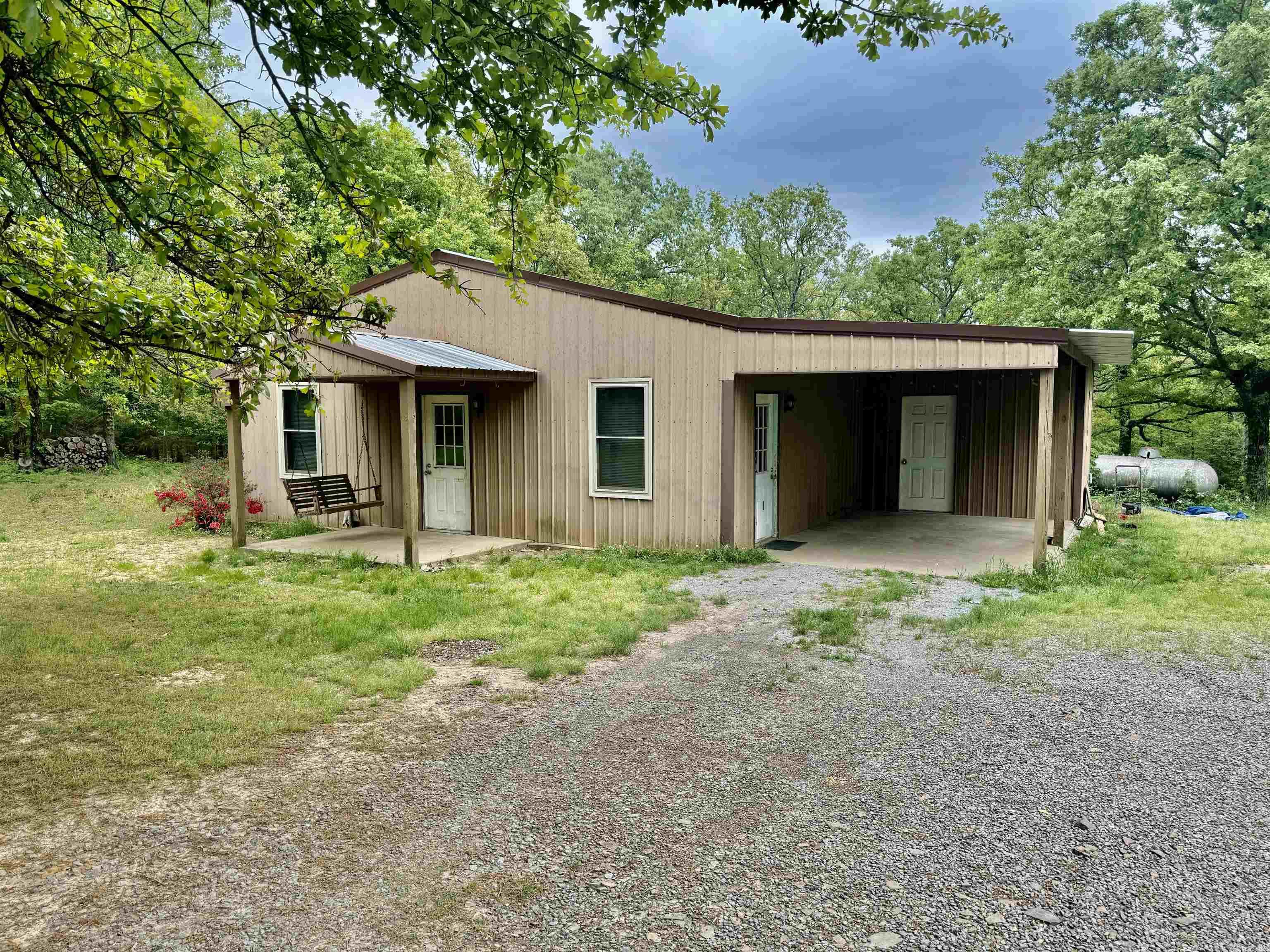 Cute 2Bd 1 1/2ba house with 1 acre of land plus a 30x24 shop totally fenced in. New Window in 2023 throughout. New roof in 2022.