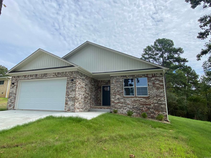 NEW Construction convenient to everything Hot Springs has to offer! Granite, in the kitchen and bathrooms, beautiful tile showers/tub surround, stainless appliances, covered back porch and more! Nice sod and sprinkler system are added bonuses to low maintenance living!