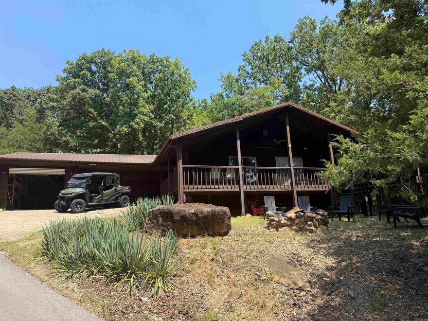 Welcome to this stunning 3 bedroom, 3 bath Lakeview home offering the perfect blend of comfort and character.  Step inside to find a light-filled living area featuring a soaring ceiling with exposed wood that creates a warm, inviting atmosphere.  The kitchen and bathrooms shine with freshly painted cabinets and trim giving a crisp updated look.  Enjoy morning coffee or evening sunsets on the wrap around deck, perfect for entertaining.  Outside, gather around the fire pit and take in the peaceful surroundings.  This home also features a large garage with a work area and built in shelves, providing plenty of storage and space. HOA $150 annually.