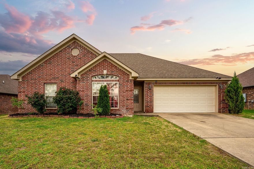 Discover your dream home in the heart of Vilonia! This charming brick house features a spacious living room perfect for gatherings and a large primary suite complete with a walk-in closet. Enjoy cooking in the open kitchen equipped with stainless steel appliances and pantry, seamlessly flowing into the dining area. Step outside to the fenced-in backyard that offers a private oasis for outdoor fun, ideal for kids and pets to play safely. Fresh landscaping enhances the home's curb appeal. Plus, with close proximity to schools, this home is perfect for anyone looking for comfort and convenience. Don't miss out on this fantastic opportunity!