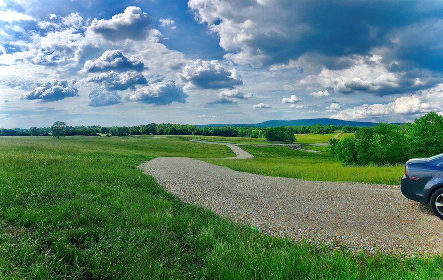 5 acres of land that already has the necessities started so you can start building your dream home! Or you can have a mobile home or manufactured home (with restrictions.) Has a gravel driveway put in, a drainage culvert added, and a location cleared to build. Well has been drilled an extra 50 ft and a perk test has been completed.   Has a mountain view and is close to hunting, fishing, boating and hiking. See agent remarks for directions once you get to the land.  Attached are subdivision by laws and survey.