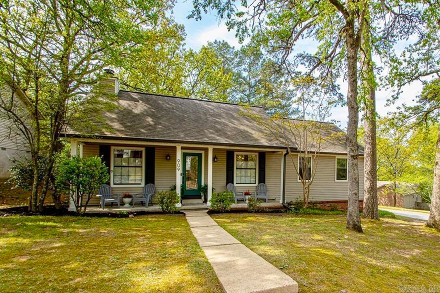 Stylish WLR one-level with gorgeous outdoor spaces for entertaining! This home has it all! Bright & open floorplan, cozy woodburning fireplace, vaulted wood ceiling, hardwood floors, inviting front porch. Stunning kitchen has a coffee nook, granite & quartz counters, bar seating, stainless appliances, gas stove, custom cabinets, built-in Pantry with internal drawers, under cabinet lighting, and a lemonade bar for passing drinks out the Kitchen window to guests on the Deck. The built-in buffet in the elegant Dining area has a feature wall & ample storage. The spacious Main Suite retreat has a private full bathroom, sitting area, large Walk-In-Closet, and direct access to private deck. Convenient cute mudroom for dropping shoes, coats, backpacks. Private fully enclosed deck for dinner parties under the stars. Living area & deck are wired for sound. New water heater. New gutters with leaf guards. 2-car Garage with extra storage. Conveniently located close to shopping/dining. Great walking neighborhood w/ pool, tennis courts, and playground.