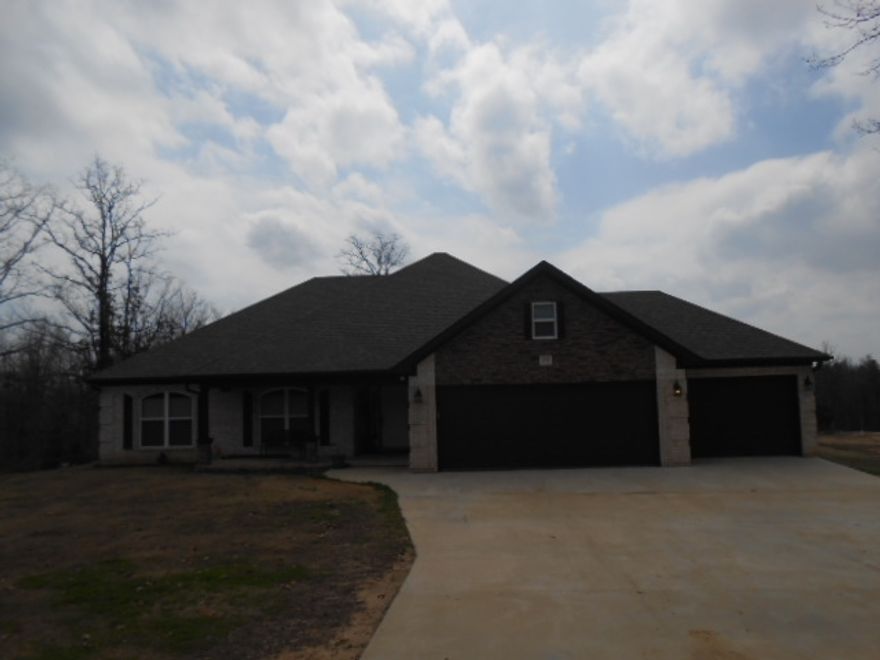 Checkout this beautiful view overlooking Crowley's Ridge on 1.5 acres +/-! This home offers 4 bedrooms, 2 baths, split floor plan, 3 car garage, screened-in porch, grilling deck, above ground pool and a shop. Entertain inside or out in the open living/kitchen concept with vaulted ceilings and a formal dining room. The master bedroom has a vaulted ceiling, large window with a gorgeous view and access to the screened-in porch. The master bathroom offers a jetted  tub and much more!