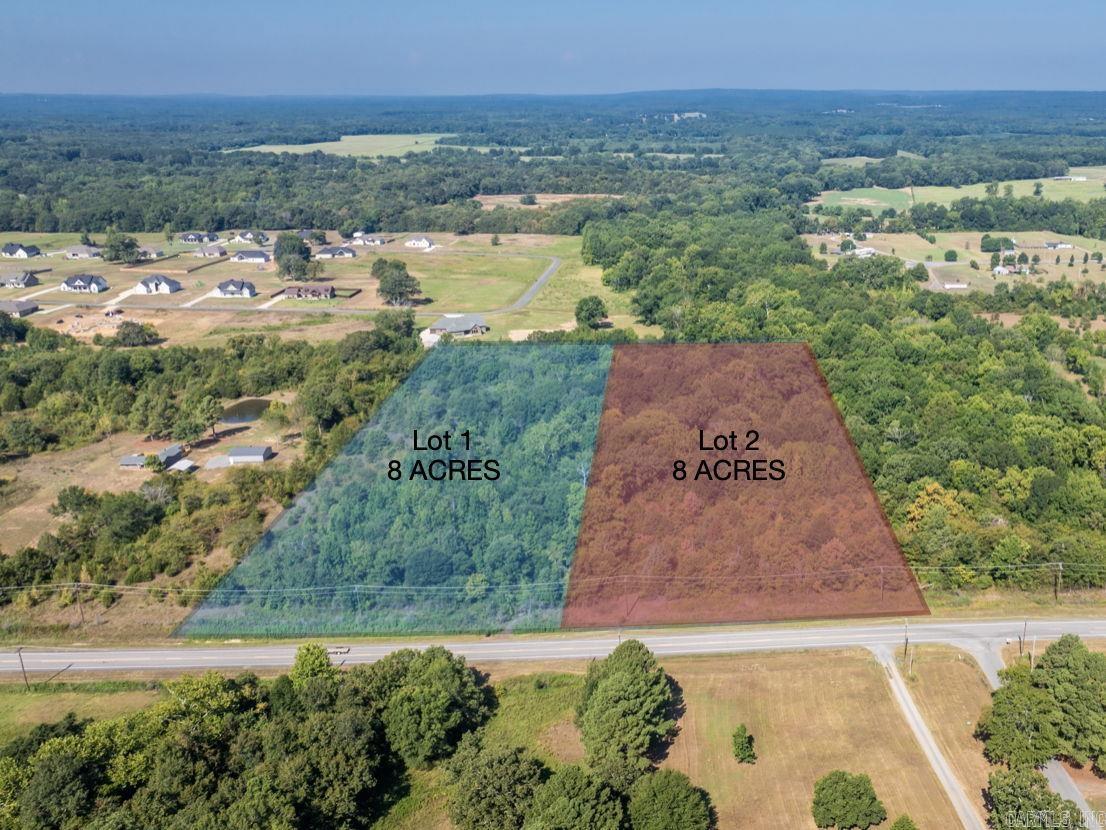 Nice tract of flat land North of Wooster. Wooded property that you can make your own. Wooster water at the road. Picture is labeled lot 1 and that is tracts 4 and 5 together. Lot 2 is also for sale.