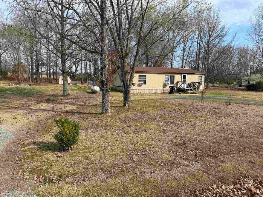 This is an investor's dream!  This one acre lot with mobile home is in a prime location between Vilonia and Conway shopping!  With some TLC, This home would be a great addition to your investment portfolio.  This one acre lot is beautiful!  The home is being sold As Is.  Schedule your showing today!