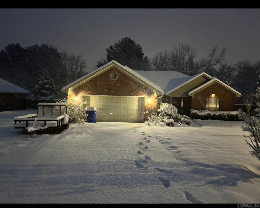 Inviting home with split floor plan. Large deck and back yard for garden, peaceful days/evenings or entertaining. Newer gas stove. Living room with vaulted ceiling and fireplace.