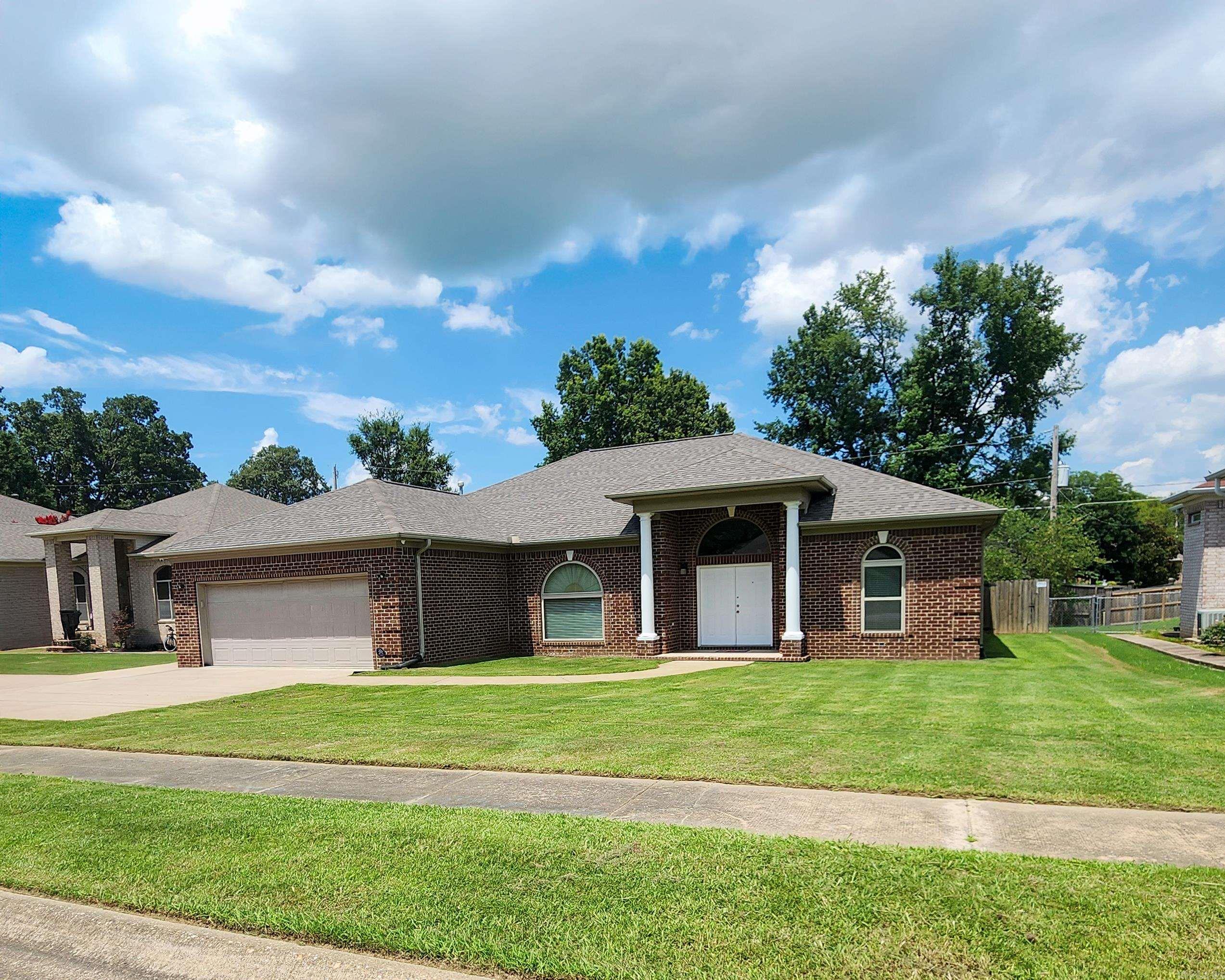 Charming, Updated Home in Beautiful North Little Rock This light-filled, freshly painted home features 3 bedrooms, 2 full bathrooms, 2 living rooms, a formal dining area, and a breakfast nook. The split-bedroom floorplan offers privacy, with a spacious master suite on one side, complete with dual showerheads, whirlpool tub, and his-and-her walk-around closets. Property Highlights: Roof & windows replaced in 2024 Security system with DVR Extended driveway & metal gate on patio (opens fully/partially) Property has a recessed lighting all around the house. Double-door front entry Appliances included: refrigerator, washer, dryer, freezer (in garage) Located in a friendly neighborhood with great schools and convenient access to major highways, the Little Rock Airport, shopping, and restaurants. Virtual tour available with furniture-free viewing and room measurements!