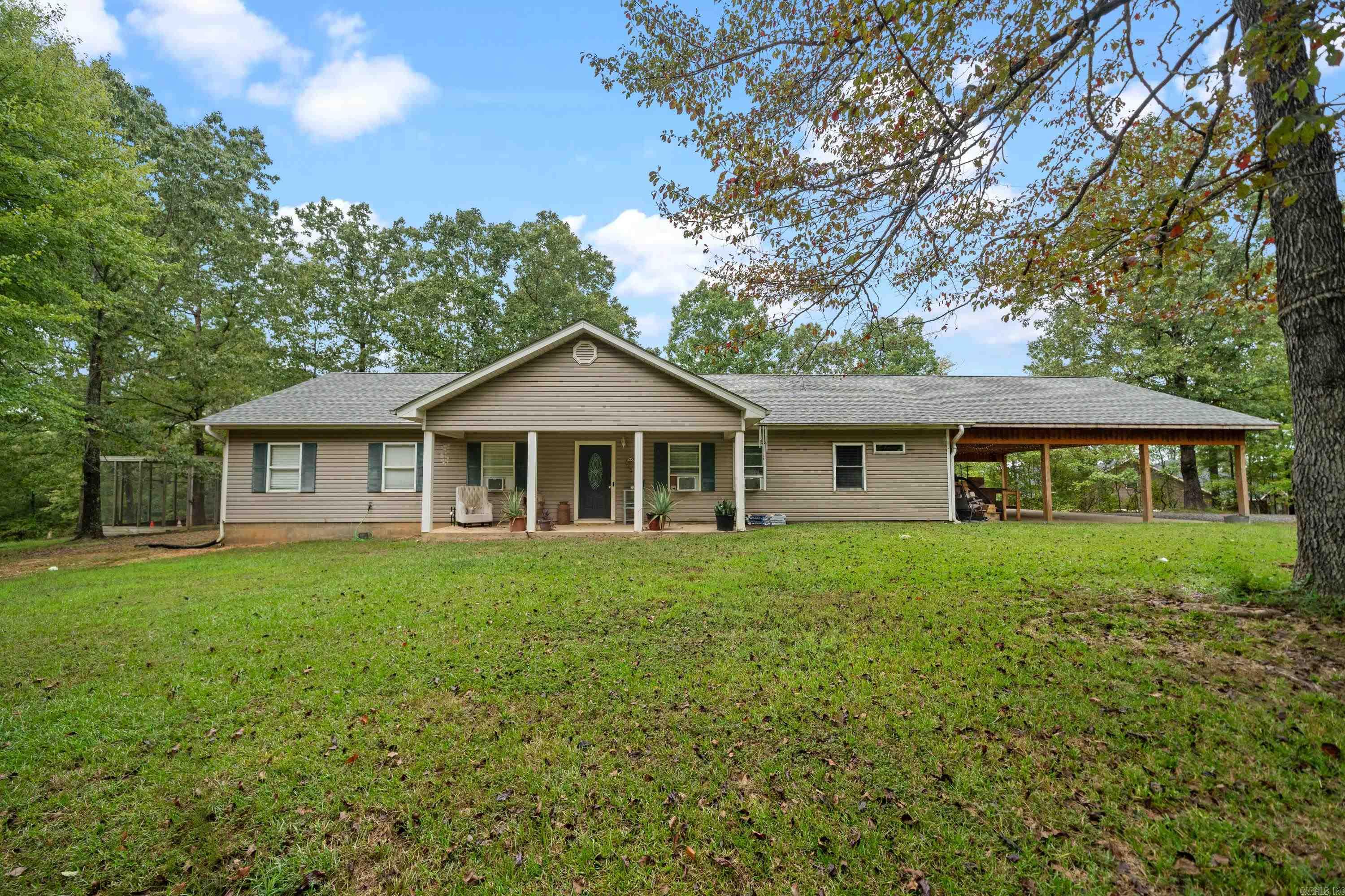 Discover your dream home in Royal, Arkansas! This spacious 4-bedroom, 3-bath residence sits on a generous 3 acres, providing plenty of room for outdoor activities and relaxation. Nestled in a quiet cul-de-sac, you’ll enjoy peace and privacy while being conveniently located near the beautiful Lake Hamilton. Families will appreciate being in the highly regarded Lake Hamilton School District, ensuring excellent educational opportunities for your children. With ample space for gardening, recreation, or simply enjoying nature, this home is the perfect blend of comfort and tranquility. Don’t miss the chance to make this idyllic property your own! Already has a homestead credit.