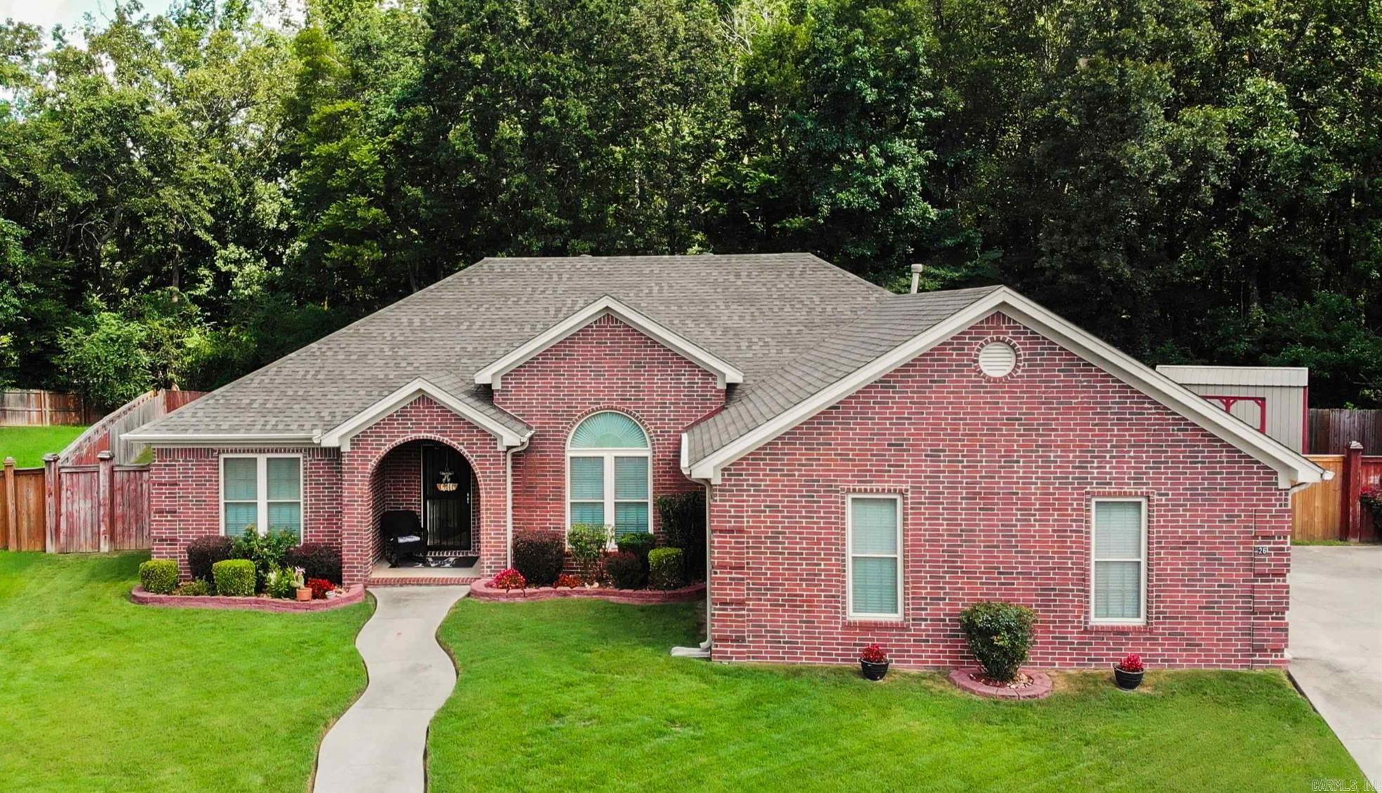 A beautifully maintained 4-bedroom, 3-bathroom home located in a peaceful, established neighborhood. This spacious property offers a split floor plan, two inviting living areas, and a versatile flex room ideal for a home office, playroom, or guest space. Interior features include updated flooring and windows, arched doorways, and a charming double-sided fireplace that adds warmth and character to both living spaces. The kitchen and common areas flow seamlessly, perfect for everyday living and entertaining. The primary suite serves as a relaxing retreat with a whirlpool tub, separate shower, and generous closet space. Enjoy peace of mind with a brand new roof and HVAC system already in place. You'll love the oversized garageāperfect for extra storage, a workshop area, or large vehicles. Outside, you'll find a large fenced-in backyard with a storage buildingāgreat for outdoor activities and additional storage needs. With its thoughtful updates, flexible layout, and prime location, this home is truly move-in ready and a must-see!