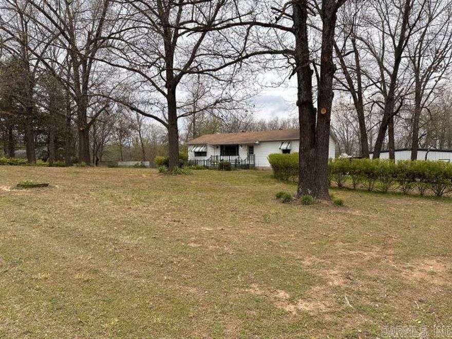 Don't miss this opportunity on this one! Located only a half mile off the Flippin Bypass and close to Walmart, it's a perfect location to start your own business in this 30x75 Red Iron shop on a corner lot right on the pavement. Also, includes nice 3 bdrm 2 bath home with large back deck with brand new HVAC system. This also includes a nice chicken house, and storage shed with plenty of room left to have a large garden. This won't last long, don't miss out.