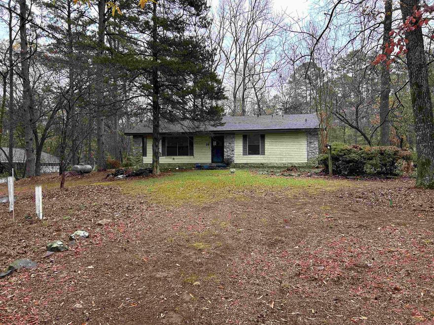 Back on the market due to no fault of its own! Charming 2-bedroom, 2-bathroom home nestled in a peaceful neighborhood! Perfectly situated just one minute from Highway 65, your commute will be a breeze. This home offers a spacious 0.95-acre lot, providing plenty of room for outdoor activities and future expansion. The property features an additional room, ideal for transforming into a 3rd bedroom, craft room, or storage space to suit your needs. With mature trees throughout the subdivision, you’ll enjoy sightings of local wildlife like squirrels and deer, adding to the serene ambiance. The home has recently had a NEW ROOF installed, offering added peace of mind. While it’s a fixer-upper, the house has tons of character and potential—just waiting for the right owner to give it some TLC and bring it to life. On Conway Corp utilities. Call/text to schedule a tour! Agents see remarks.