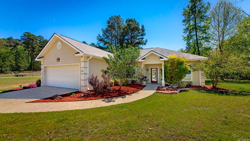 Live the Diamondhead lifestyle at 121 Blue Moon Terrace—a 3 bed / 2 bath, 1,918± SF corner-lot home built in 2010 with the space, finishes, and amenities today’s buyers search for. 1 year Home Warranty included for extra peace of mind. Inside: airy vaulted ceilings, a granite kitchen, and an attached 2-car garage with built-in loft storage. A flexible bonus room adapts to your life—and a new electric fireplace adds year-round comfort. Outside: a fresh pergola creates a private spot for morning coffee or evening gatherings. Community: Diamondhead’s resort amenities—golf, clubhouse, tennis and pickleball, Olympic-size pool, marina, and trails—are right here. Location: within Lakeside School District, about 2 miles to Lake Catherine State Park, and an easy drive to Hot Springs dining, shopping, and historic bathhouses in the Ouachita foothills.Key features buyers love: corner lot, vaulted ceilings, granite counters, flex room, garage loft storage, new electric fireplace, pergola, all-electric utilities, public water/sewer, and community recreation at your doorstep. If you’re seeking move-in comfort plus a true lifestyle neighborhood, this is the one. Schedule your private showing.