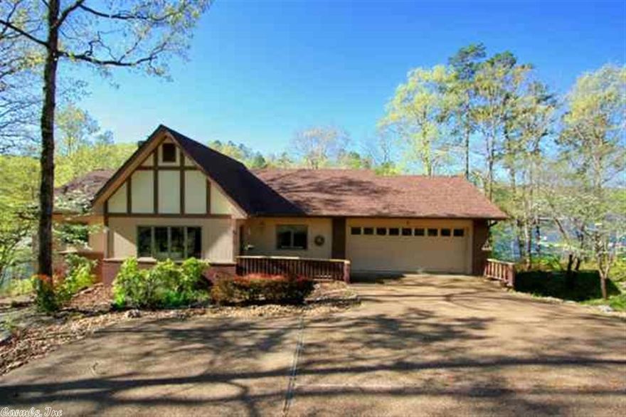 VERY AFFORDABLE LAKE LIVING COMPLETE WITH COVERED BOAT DOCK ON BEAUTIFUL LAKE CORTEZ.  WELL MAINTAINED HOME WITH OPEN PLAN FEATURING LARGE LIVING-DINING ROOM WITH VAULTED CEILING AND BRICK WOOD BURNING FIREPLACE, SPLIT BEDROOMS, AND GREAT EAT-IN KITCHEN WITH NEWER APPLIANCES AND TILE FLOOR.  YOU WILL LOVE THE VIEW, WHILE RELAXING ON THE LARGE OPEN DECK.   LOW MAINTENANCE LANDSCAPING, NEWER ROOF, HEAT PUMP, AND CARPETING. NICE WORKSHOP OR STORAGE BELOW WITH CONCRETE FLOOR. THIS ONE TODAY.