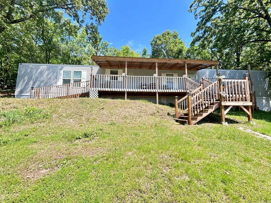 Enjoy peaceful living with a view! This well-maintained 3 bedroom, 2 bath home sits on 2 beautiful acres and features a spacious porch perfect for relaxing or entertaining. Inside, you’ll find a split floor plan with plenty of space. Whether you’re sipping coffee on the porch or taking in the surrounding scenery, this home offers the quiet charm of country living just close enough to town.