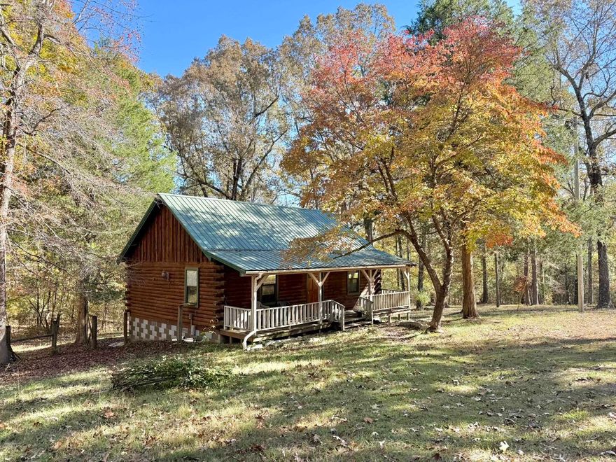 You don't want to miss this charming log cabin on 9.34 acres in Brockwell, Arkansas! This well-maintained home offers rustic appeal with modern comfort, featuring a spacious master suite and full bath on the main level plus an open loft upstairs that serves as a second bedroom or additional storage. Enjoy the covered front and back porches overlooking the property. The property has highway frontage, city water, a metal roof, brand new A/C system, and convenient outside storage with a storm shelter located beneath the house. This is a great country property with plenty of space and privacy in the heart of the Ozarks. Give me a call today for more information!