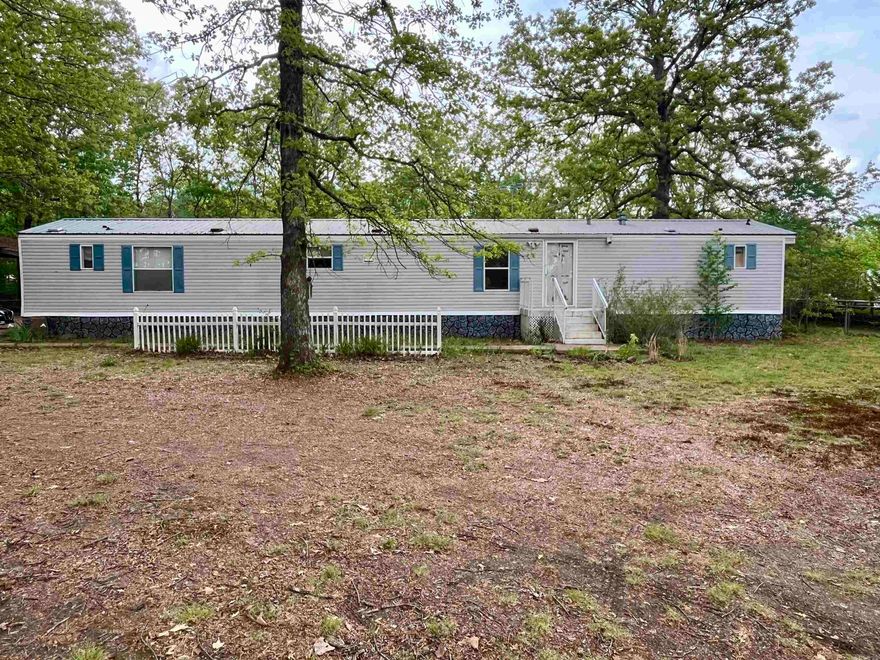 3 Bedroom 2 bath mobile home on 1.05 acres that is completely fenced with 30x30 carport and 2 sheds. This property is located close to Sugarloaf marina. Weather you looking for a full time or weekend get away this one won't last long! Comes fully furnished!