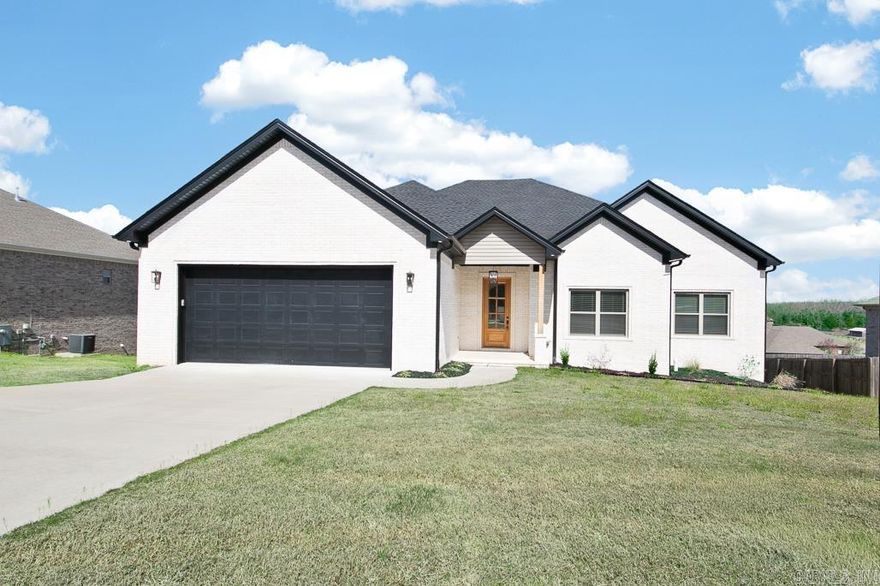 Be the first to call this stunning new construction home yours! Offering 4 bedrooms and 3.5 baths, this thoughtfully designed layout blends style and comfort. As you enter, a welcoming foyer with coat closet leads into the open living room, where a gas fireplace with custom built-ins creates the perfect cozy gathering space. The kitchen is designed for everyday living and entertaining with a breakfast bar, open shelving, and a sunny eat-in area that flows seamlessly into the living room. Retreat to the primary suite featuring a spa-like bath with tiled walk-in shower, soaker tub, dual vanities, and a huge walk-in closet that connects directly to the laundry room. The walkout basement adds even more space to spread out, while the lower-level garage offers room for a workshop or storage. With its fresh, modern finishes and smart design, this home is built for both relaxation and connection. OPEN HOUSE THIS SUNDAY 2-4!