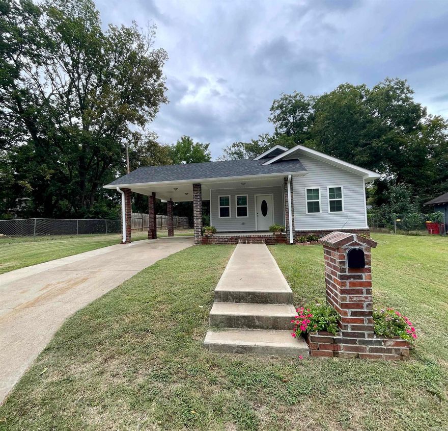 Welcome to your dream home on Lane Street in picturesque Morrilton, Arkansas! This beautifully updated 1,260 sq. ft. residence combines modern comfort with classic charm. Featuring 3 spacious bedrooms and 2 pristine bathrooms, this property is perfect for anyone seeking both style and functionality.  Key Features:  Completely Renovated: Enjoy the luxury of a fresh start with every corner of this home thoughtfully updated to reflect contemporary design and quality craftsmanship. Peace of mind comes standard with a brand-new roof and energy-efficient HVAC system, ensuring comfort and durability for years to come.  Step into a bright and airy living area with new flooring and fresh paint, creating a welcoming atmosphere for both relaxation and entertaining. The heart of the home boasts updated appliances, sleek countertops, and ample cabinetry, making meal preparation a delight. Both bathrooms have been elegantly remodeled with modern fixtures and finishes. The property includes a well-maintained yard, perfect for outdoor gatherings or simply unwinding in your private space.  Schedule your showing today and experience all that this delightful residence has to offer!