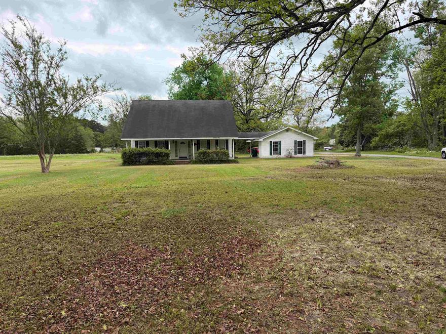 Three bed two bath two story home on a beautiful 1.04 acre lot.  With a little love this home can be restored to its original beauty.