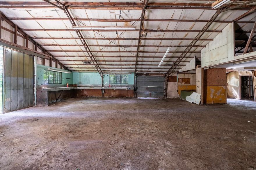 Perfect location for an auto repair shop, welding shop, offices or turn into apartments. This property has perfect access between Jacksonville and Cabot with easy access to the freeway and minutes to shopping and town!! Sits outside city limits and zoned for commercial. There is additional lot next door available for more land. Sold AS IS.