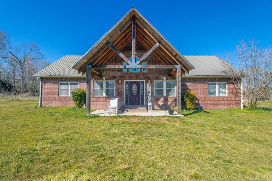 Farm life is calling. This stunning 3-bedroom, 2-bath, one-level home on 15 fenced acres blends comfort, function, and wide-open possibility. With a split floor plan, tall ceilings, and walls of windows, the home feels bright, airy, and welcoming from the moment you walk in. The kitchen offers a large pantry, while the primary suite features his-and-hers closets, a soaker tub, and an oversized walk-in shower with a low step-in entry. The guest bath includes a double vanity, giving everyone a little extra room. Step outside and you’ll find the setup so many buyers are hunting for: a 6-stall horse barn, fenced acreage, and neighbors with land that help preserve the peaceful rural feel. The detached 2-car garage, connected by a breezeway, is already equipped with electricity, plumbing for a full bath, and a large built-in storm shelter—ready to become a guest suite, man cave, hobby space, or home office. Located in the Beebe School District, this property offers the space and freedom to live the country lifestyle without giving up comfort. You have hi-speed wi-fi and everything you need to never leave home.