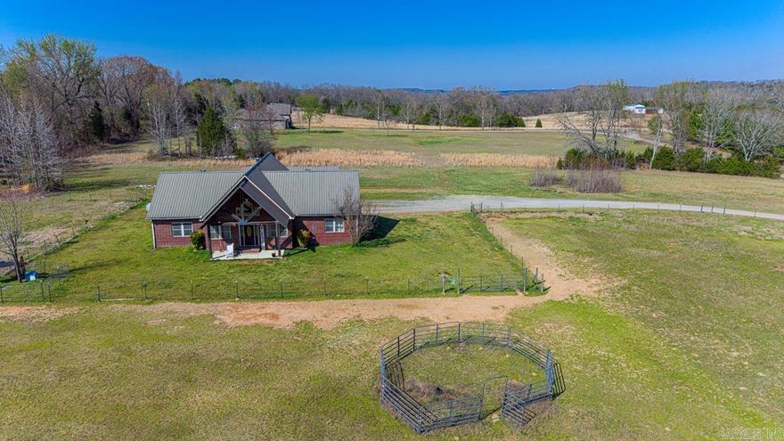 Farm life is calling. This stunning 3-bedroom, 2-bath, one-level home on 15 fenced acres blends comfort, function, and wide-open possibility. With a split floor plan, tall ceilings, and walls of windows, the home feels bright, airy, and welcoming from the moment you walk in. The kitchen offers a large pantry, while the primary suite features his-and-hers closets, a soaker tub, and an oversized walk-in shower with a low step-in entry. The guest bath includes a double vanity, giving everyone a little extra room. Step outside and you’ll find the setup so many buyers are hunting for: a 6-stall horse barn, fenced acreage, and neighbors with land that help preserve the peaceful rural feel. The detached 2-car garage, connected by a breezeway, is already equipped with electricity, plumbing for a full bath, and a large built-in storm shelter—ready to become a guest suite, man cave, hobby space, or home office. Located in the Beebe School District, this property offers the space and freedom to live the country lifestyle without giving up comfort. You have hi-speed wi-fi and everything you need to never leave home.