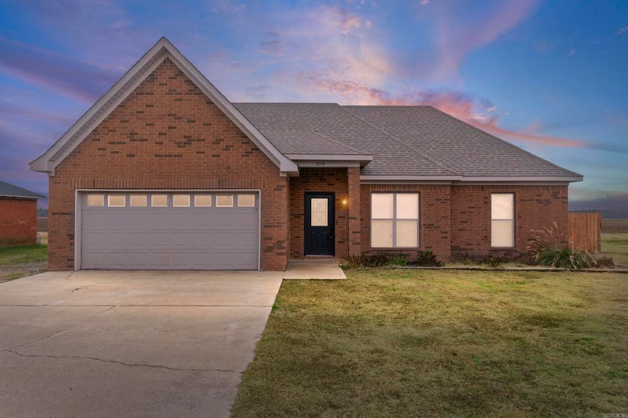 Budget-friendly and thoughtfully designed, this 3-bedroom, 2-bath home offers impressive value with a spacious open-concept living, dining, and kitchen area featuring high ceilings and abundant natural light. The split floorplan provides a comfortable primary suite with a full bathroom and large walk-in closet, while two additional bedrooms and a guest bath sit just across the main living space. Recent updates include a refreshed fireplace, roof replacement, fresh interior paint, and other improvements. Located in Deer Valley, this home offers an “out-of-town” atmosphere while remaining convenient to city amenities. With an attached garage, a detached storage building, and true move-in readiness, this property delivers both function and style. Don’t miss the opportunity to make it yours.