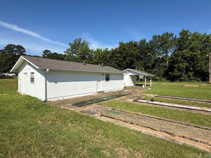 Unique Commercial Property in Batesville City Limits near Eagle Mtn. Golf Course. This 1.82 acre parcel is locally known as the old location of the ''putt-putt'' course. It has 2 of the original buildings including an 800 sq. ft. main building that's been completely remodeled with new shingles, paint, flooring, kitchenette, bathroom, HVAC and more! It's a level lot with endless possibilities and ample parking. It's the perfect location for a business to set up a headquarters and expand as they need to grow. Enjoy close proximity to most of Batesville's primary shopping areas and many of its residential areas. If your business doesn't need a high traffic area but wants a convenient location, check this property out!!
