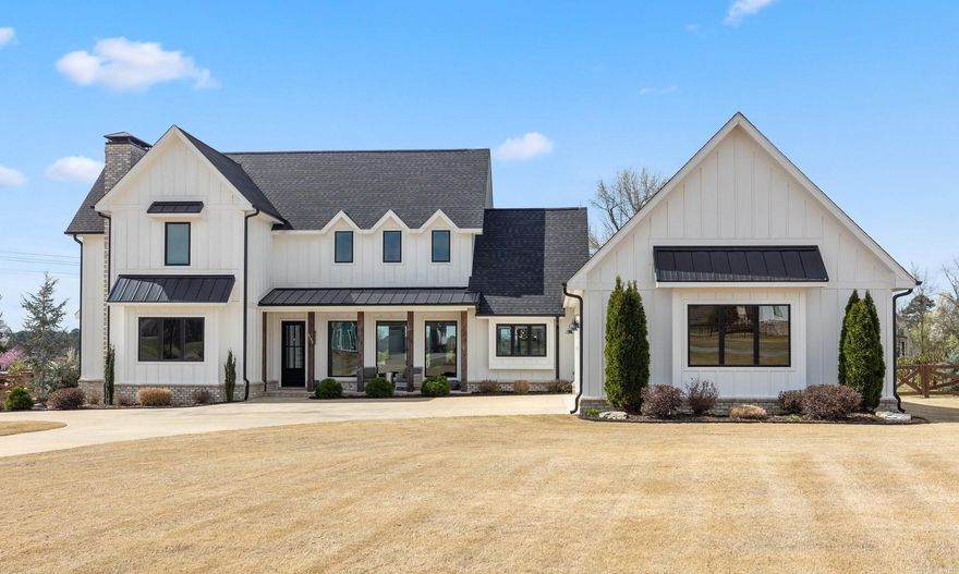 STUNNING FARMHOUSE WITH A POOL ON 1.27 ACRE LOT! This custom built home features a soaring 30 ft ceiling, gas fireplace, and hardwood floors in living room. The open kitchen includes a large island with leathered granite, 6 burner Fisher and Paykel gas range, double ovens, ice maker, wine fridge, and walk-in Butler’s Pantry. The primary suite features wood details throughout, a spacious custom tile shower, and separate walk-in closets. An inviting hearth room with fireplace and built-in humidor is great for relaxing and the private office space with built in desk area is ideal for those who work from home. Upstairs features 3 bedrooms and 2 Bathrooms. Laundry Room includes a laundry chute and is connected to primary suite.  The backyard is a private oasis with gorgeous gunite pool that includes a tanning deck, swim up bar, umbrella shelf, and fire pit. Covered back porch includes a fireplace and gas hookup for grilling. Fully Fenced and extensively landscaped including 30 magnolia trees!