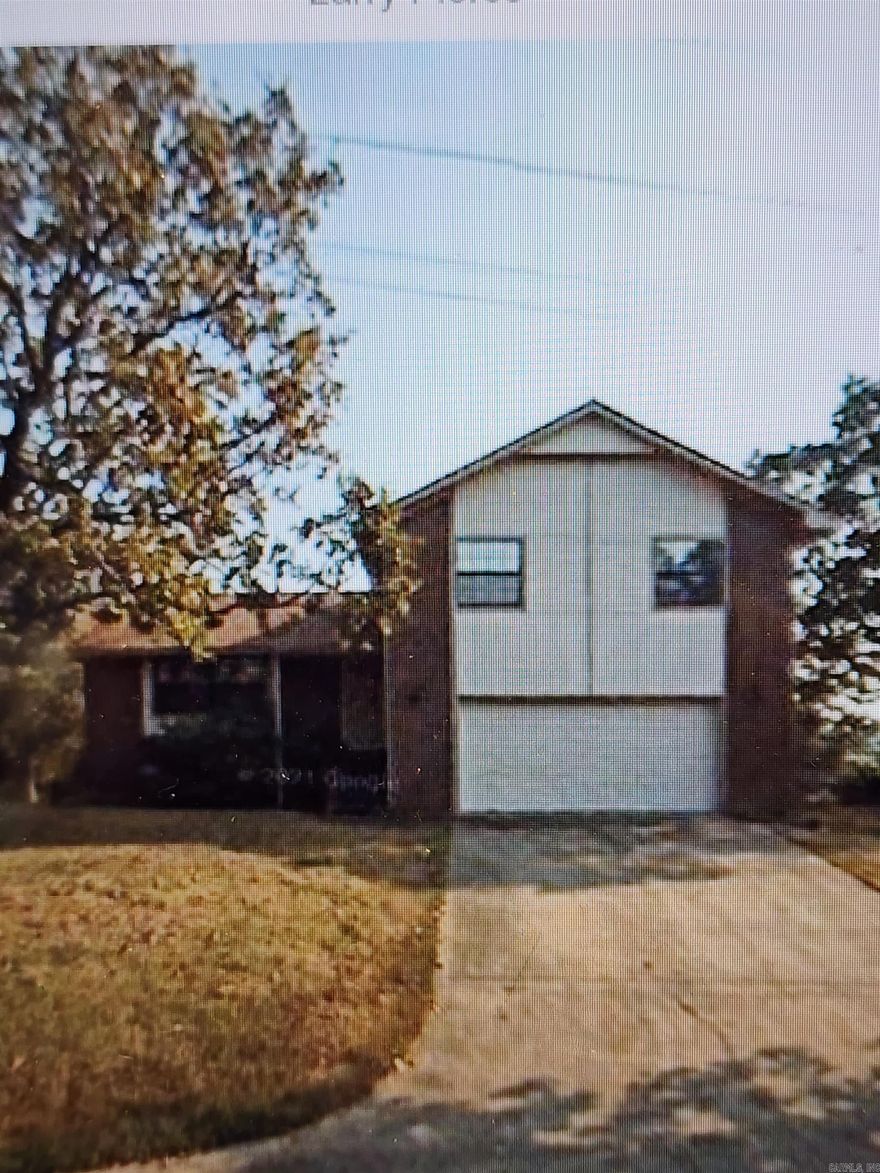 Great investment! Serene wooded view! Home needs repairs, this is a diamond in the ruff.