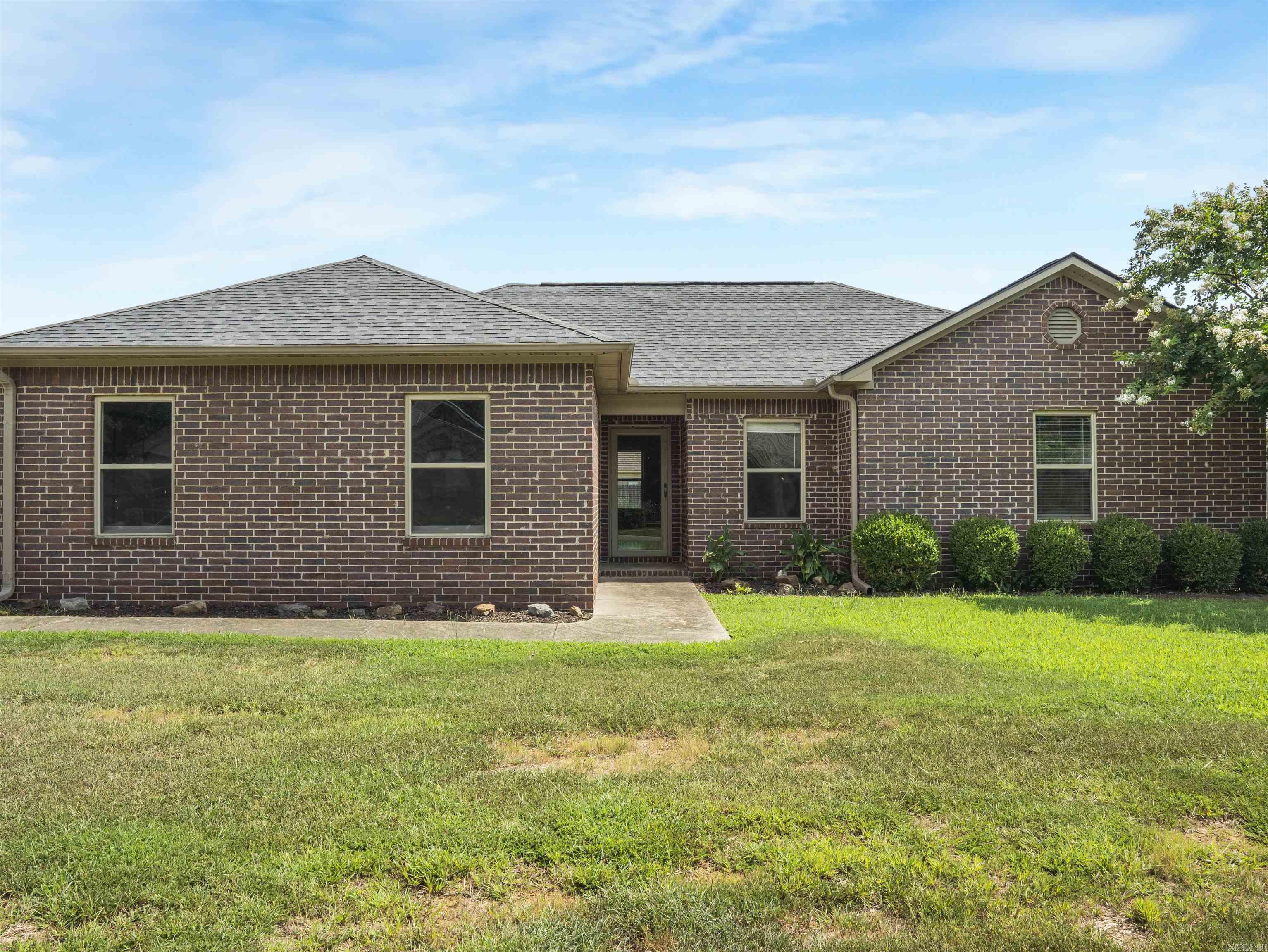 Wow! Beautiful ALL BRICK 3 bedroom 2 bath home ideal for first time home buyers or those looking to downsize. Great location near Ward Elementary and accessibility from Cabot's newest I-57's exit 21. Wonderful open vaulted ceiling family room with dining and kitchen. Laminate and tile throughout home. Kitchen island and pantry make kitchen user friendly. Home features crown moldings and medallions. Family oriented covered back porch with spacious privacy fenced backyard with street gate access. Home has gutters and a new roof was installed in 2022. Great corner lot with side load insulated oversized garage feature extra wide driveway. Home security system installed but not currently under contract. This home will please. Call today for viewing.