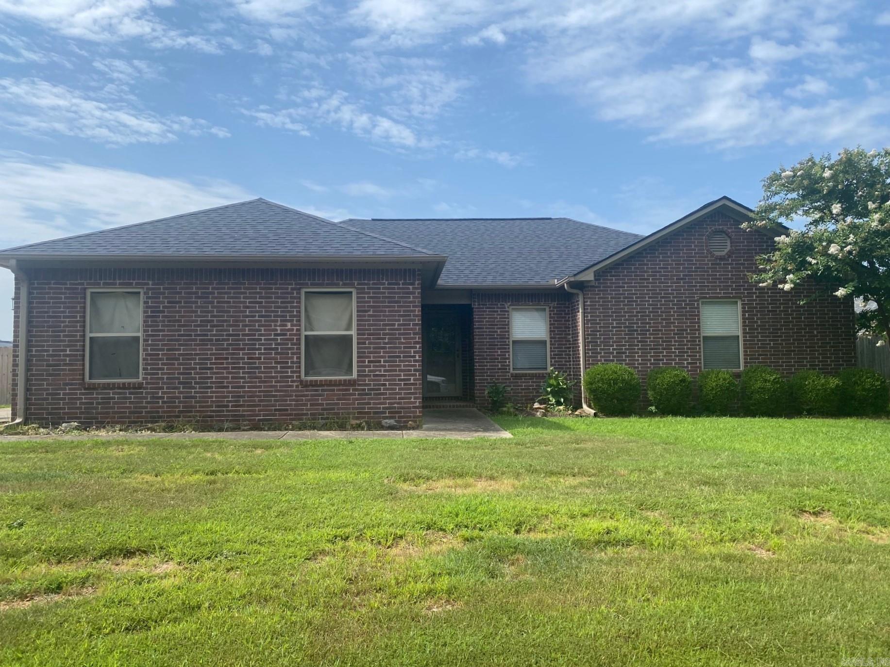 Wow! Beautiful ALL BRICK 3 bedroom 2 bath home ideal for first time home buyers or those looking to downsize. Great location near Ward Elementary and accessibility from Cabot's newest I-57's exit 21. Wonderful open vaulted ceiling family room with dining and kitchen. Laminate and tile throughout home. Kitchen island and pantry make kitchen user friendly. Home features crown moldings and medallions. Family oriented covered back porch with spacious privacy fenced backyard with street gate access. Home has gutters and a new roof was installed in 2022. Great corner lot with side load insulated oversized garage feature extra wide driveway. Home security system installed but not currently under contract. This home will please. Call today for viewing.